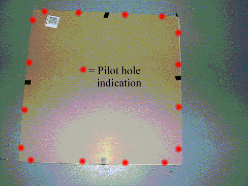 Bottom taped on, pilot holes drilled